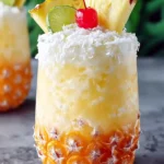 Non Alcoholic Piña Colada Punch for Refreshing Summer Fun First Image