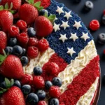 american flag cake with fresh berries First Image